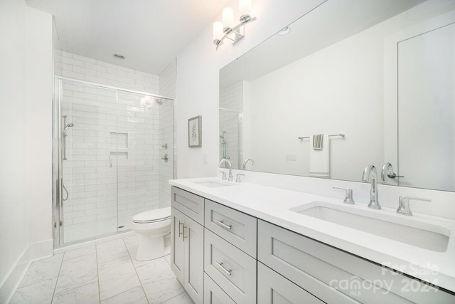 bathroom with walk in shower, vanity, and toilet