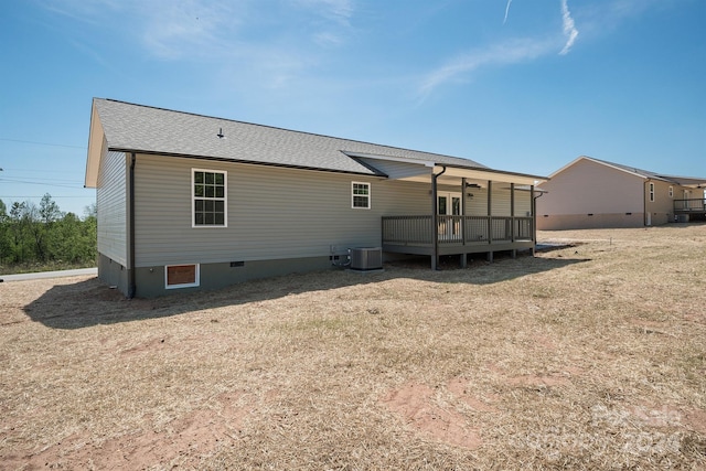 back of house featuring a deck and central air condition unit