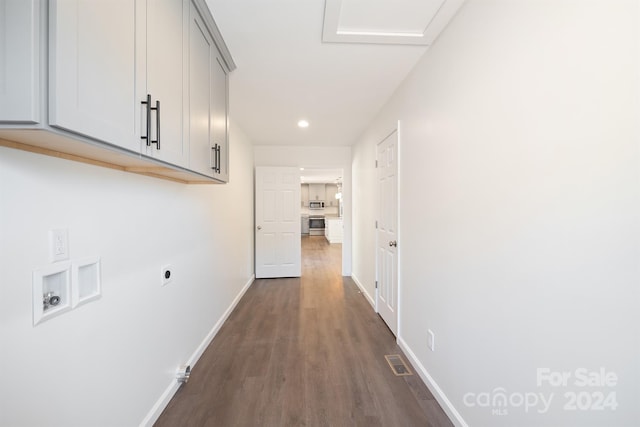 corridor with dark wood-type flooring