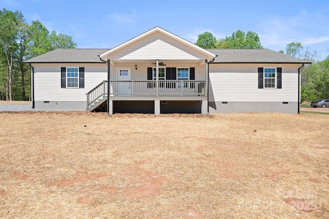 view of front of property featuring ceiling fan and a porch