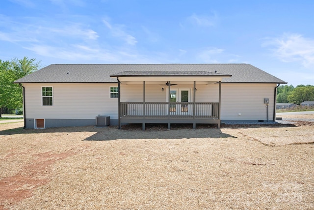 back of property with central air condition unit and a wooden deck