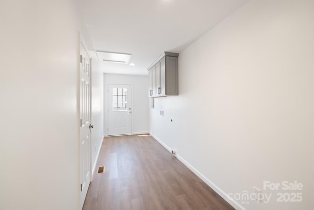 entryway with dark wood-type flooring