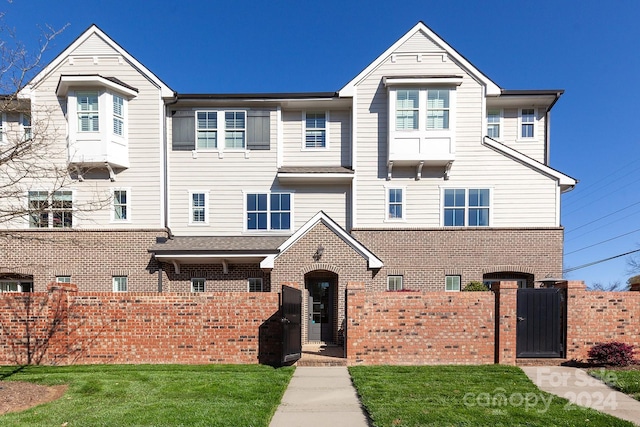 view of front of house with a front yard