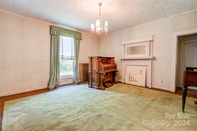 misc room with ornamental molding, a chandelier, and hardwood / wood-style flooring