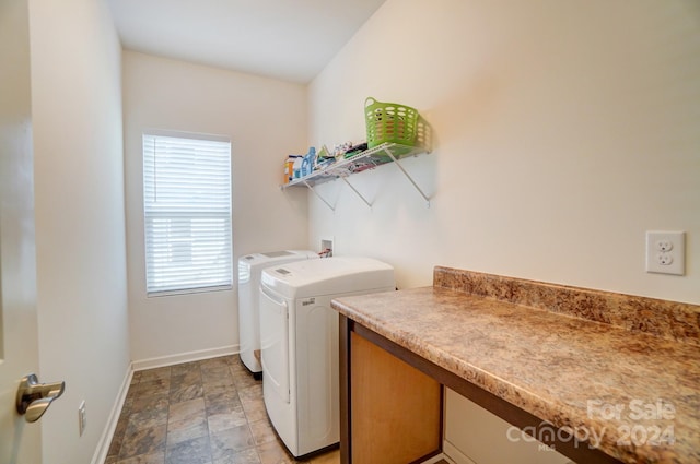 clothes washing area featuring light tile floors, washing machine and clothes dryer, and hookup for a washing machine