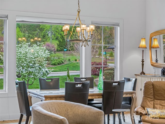 dining area with a notable chandelier