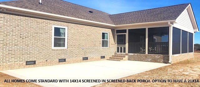 rear view of property with a sunroom and a patio