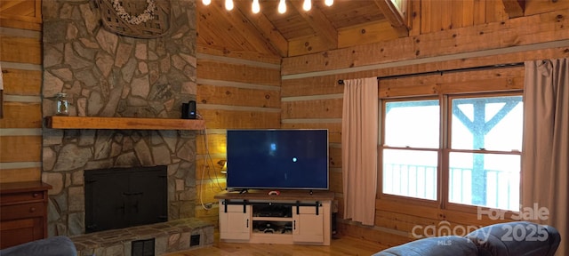 living room featuring vaulted ceiling, a stone fireplace, wooden walls, wooden ceiling, and light wood-type flooring