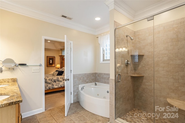 bathroom with tile flooring, crown molding, independent shower and bath, and vanity