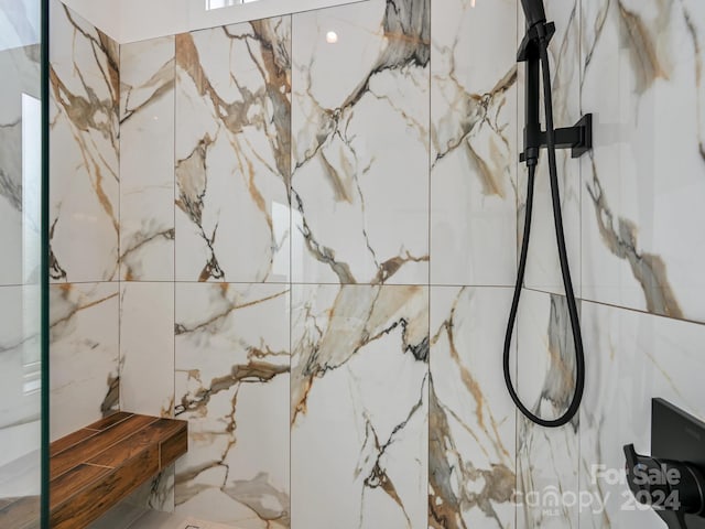 interior space with a tile shower