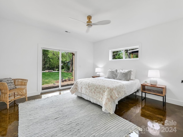 bedroom featuring ceiling fan and access to exterior