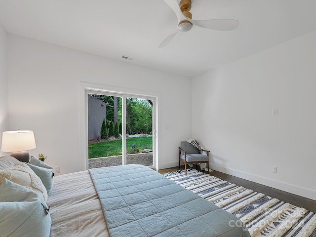 bedroom with hardwood / wood-style flooring, ceiling fan, and access to outside