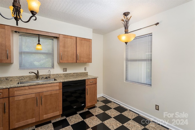 kitchen featuring black dishwasher, hanging light fixtures, a notable chandelier, and sink