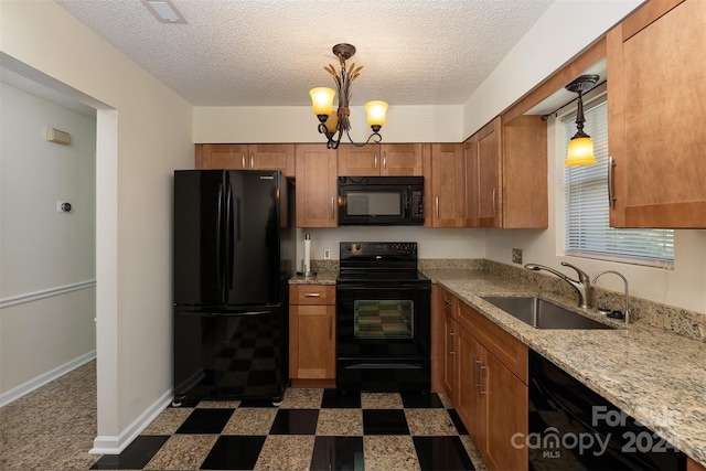 kitchen with a chandelier, sink, black appliances, and decorative light fixtures