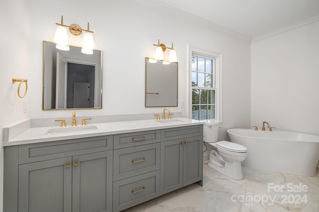 bathroom featuring vanity, toilet, ornamental molding, and a tub