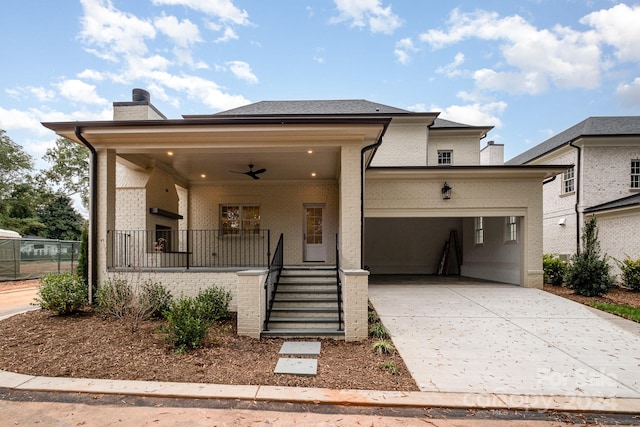 view of front of property with covered porch, a carport, and ceiling fan