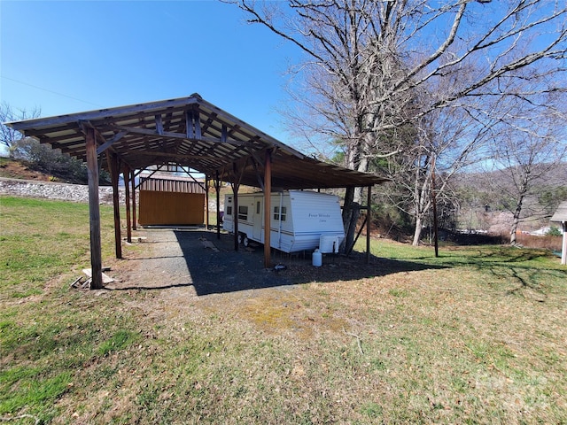 exterior space with a yard and a shed