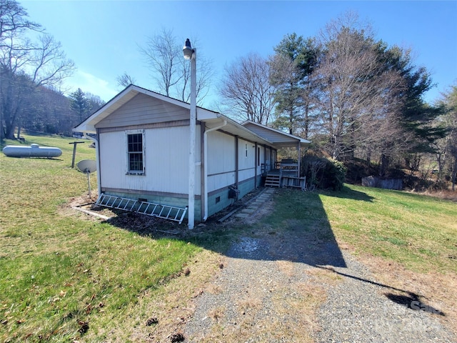 exterior space with a yard