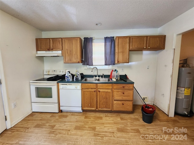 kitchen with a textured ceiling, electric water heater, sink, white appliances, and light hardwood / wood-style flooring