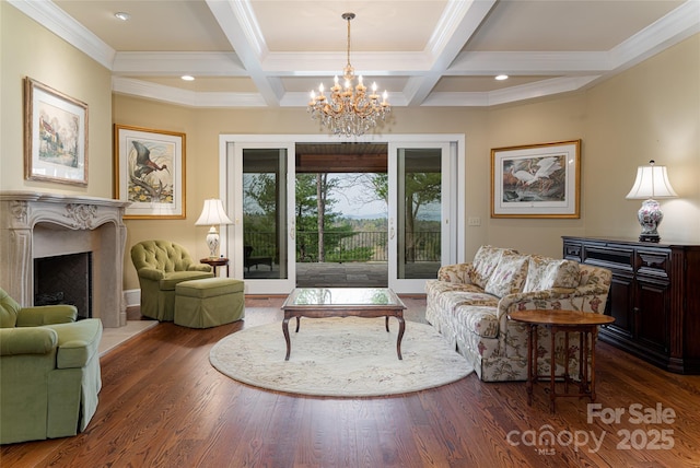 living room with ornamental molding, beam ceiling, and coffered ceiling