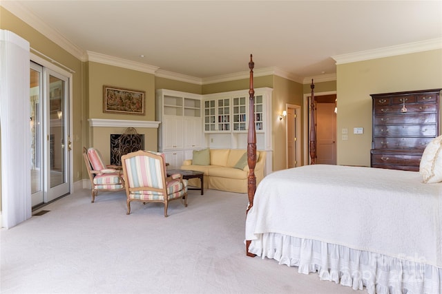 carpeted bedroom featuring ornamental molding, french doors, and access to outside