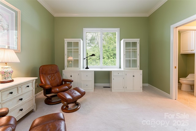 living area featuring light colored carpet and ornamental molding