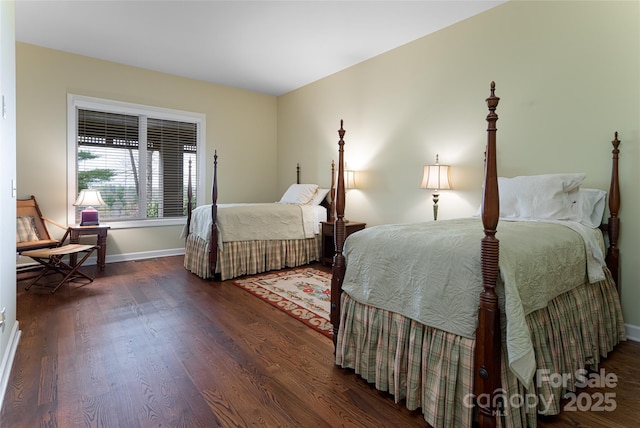 bedroom featuring dark wood-type flooring