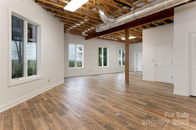 spare room featuring dark hardwood / wood-style flooring