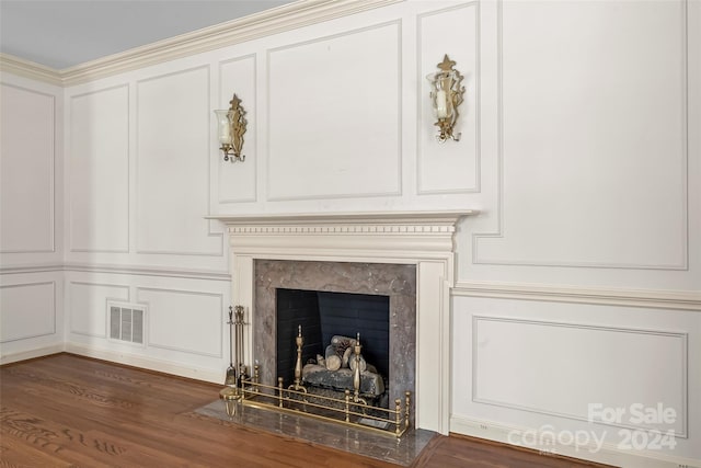 interior space featuring crown molding and dark hardwood / wood-style floors