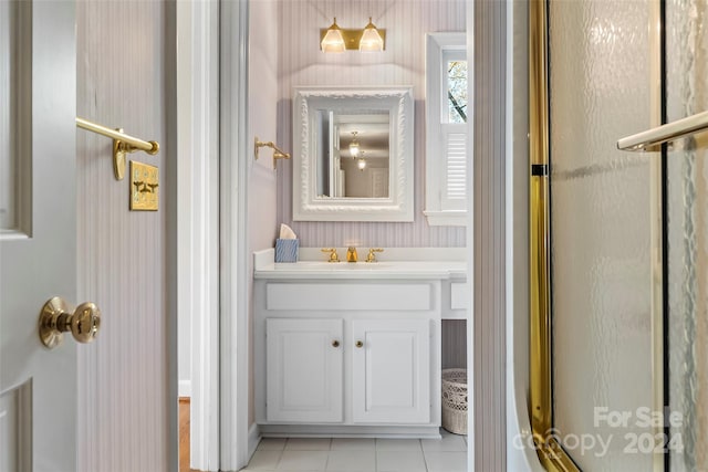 bathroom with tile floors and oversized vanity