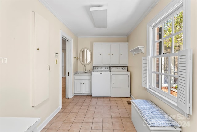 interior space with white cabinetry, sink, independent washer and dryer, ornamental molding, and light tile flooring