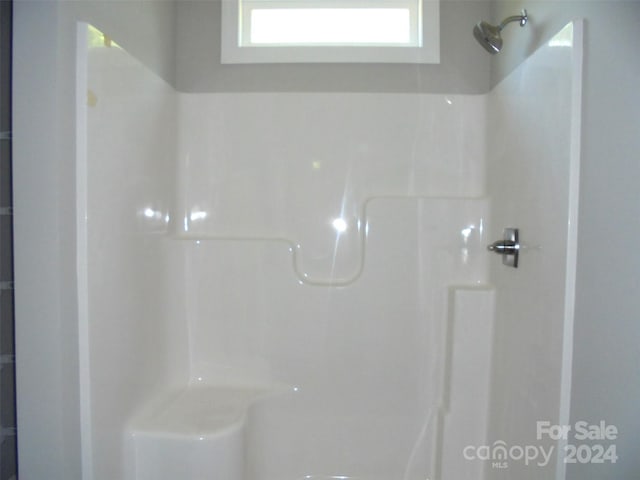 bathroom with a shower