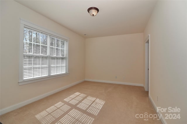 view of carpeted spare room