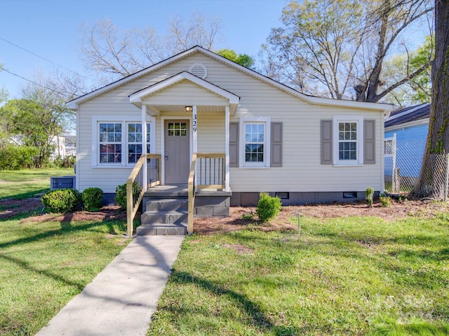 view of front of home with a front yard