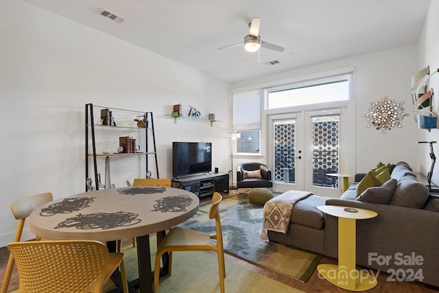 living room with french doors and ceiling fan