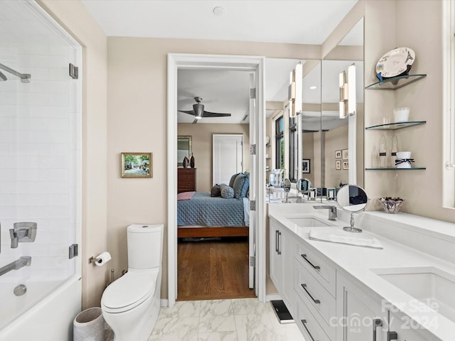 full bathroom featuring wood-type flooring, ceiling fan, dual bowl vanity, and tiled shower / bath