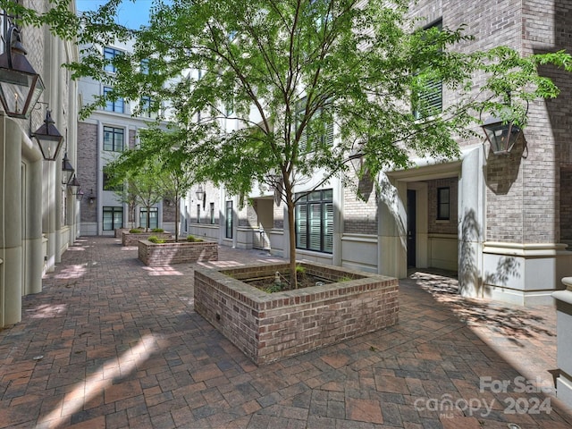 view of home's community with a patio