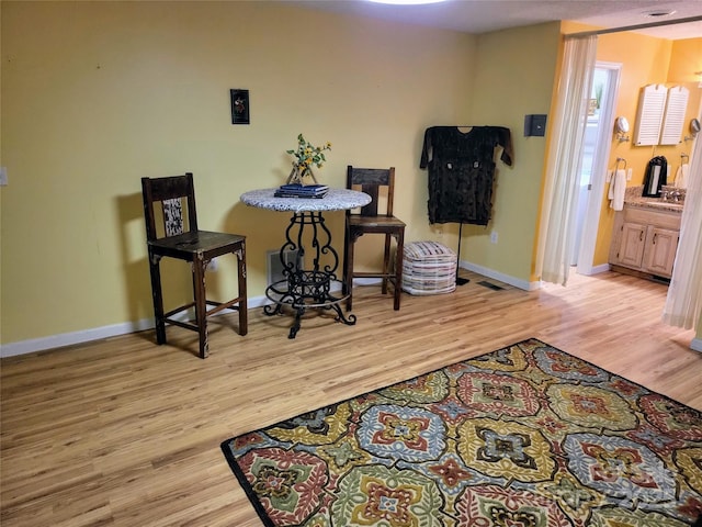 dining room with light hardwood / wood-style floors