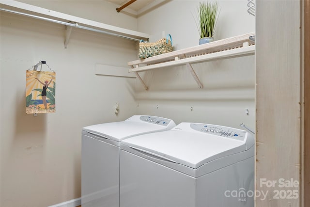 laundry room with washer and dryer