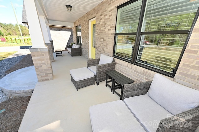 view of terrace featuring covered porch