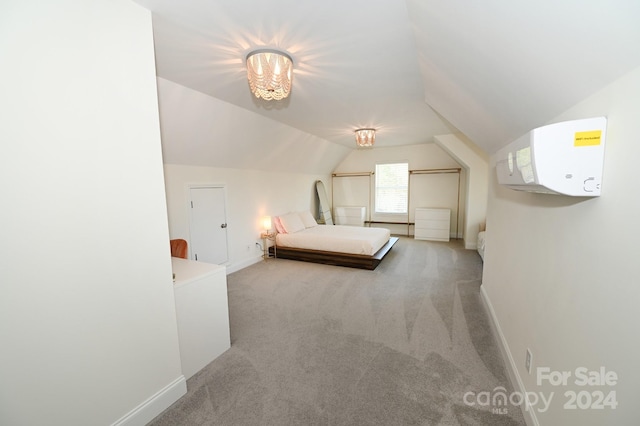 unfurnished bedroom with light colored carpet and lofted ceiling