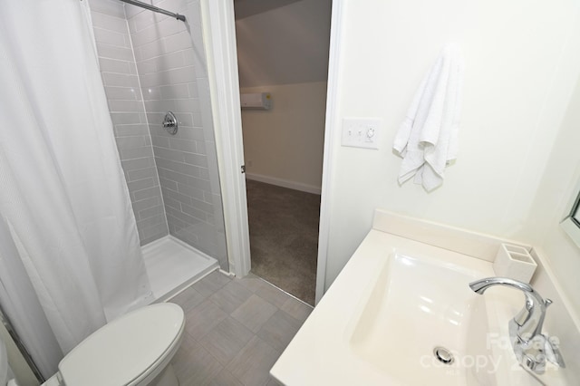 bathroom featuring walk in shower, sink, toilet, and tile flooring