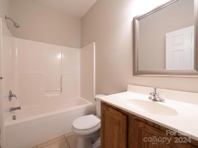 full bathroom featuring shower / washtub combination, tile patterned flooring, vanity, and toilet