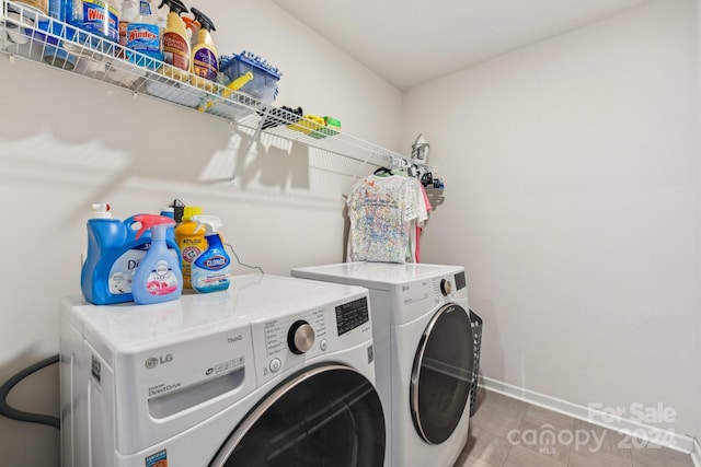 laundry area featuring washing machine and dryer