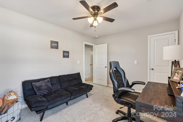 carpeted office with ceiling fan