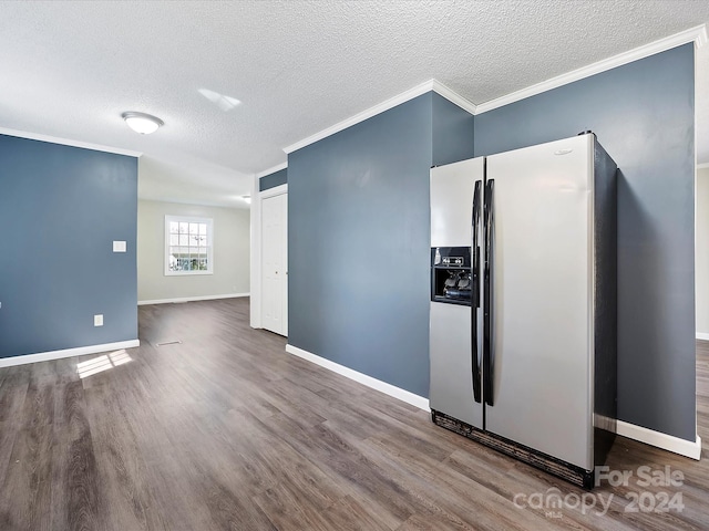 kitchen featuring ornamental molding, a textured ceiling, stainless steel refrigerator with ice dispenser, and wood-type flooring