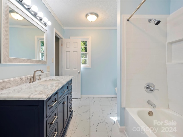 full bathroom featuring a textured ceiling, toilet, vanity, crown molding, and tiled shower / bath combo