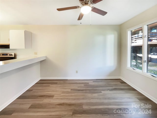 interior space featuring ceiling fan and light hardwood / wood-style flooring