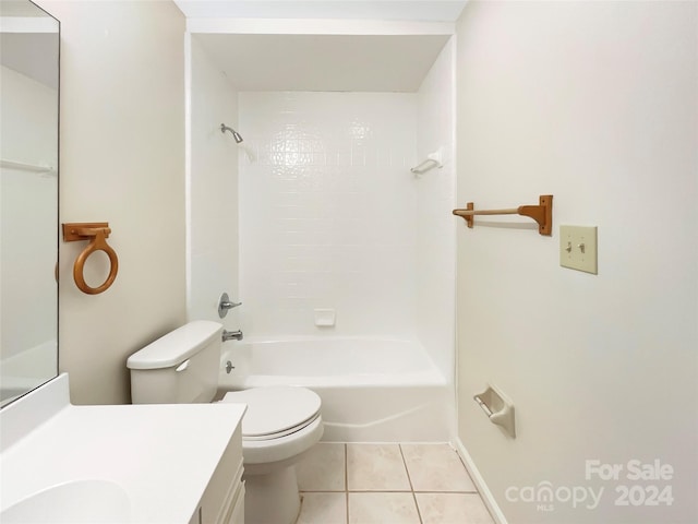 full bathroom featuring toilet, washtub / shower combination, tile floors, and vanity