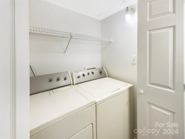 washroom with independent washer and dryer